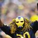 A Michigan fan cheers from the stands during the second half at Michigan Stadium on Saturday. Melanie Maxwell I AnnArbor.com